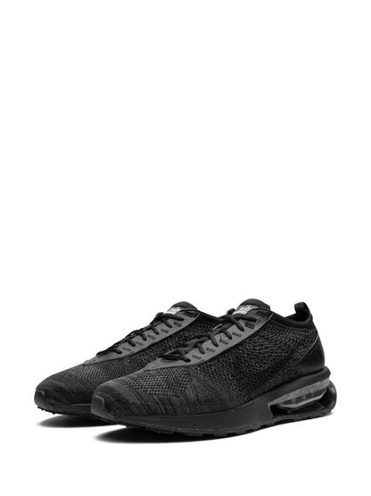 Nike
Air Max Flyknit Racer "Triple Black" sneakers